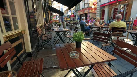 people enjoying a sunny day at a café