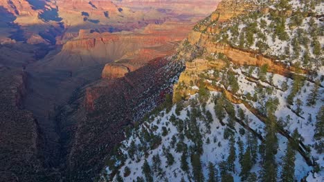 Snow-Covered-Landscape-Of-The-Grand-Canyon-In-Arizona,-USA---aerial-shot