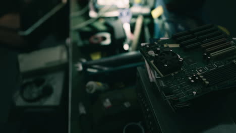 detailed close up of electronic components on a workbench during repairs