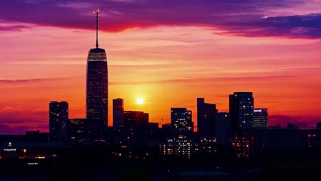 sunrise over the jersey city skyline bathes buildings in a warm glow, creating a stunning urban landscape