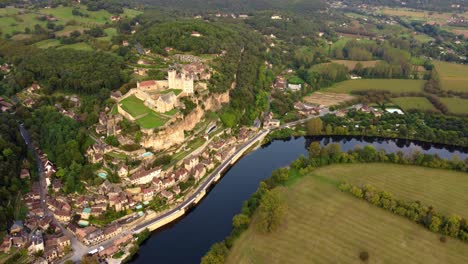 aerial view of medieval castle of beynac-et-cazenac in france near the dordogne river