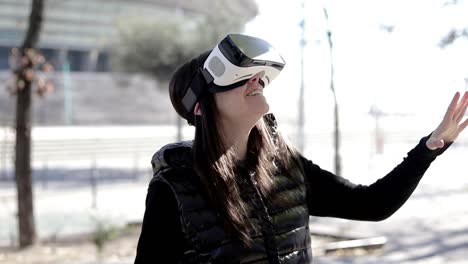 happy woman in vr headset on street