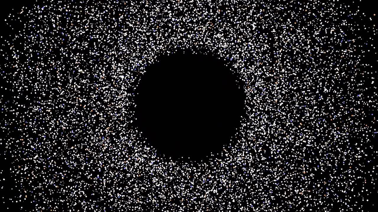 Particelle bianche esplodono verso l'esterno da un punto centrale su uno sfondo nero scuro