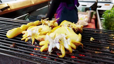 fresh grilled squid on a coal stove seafood grilled thai street food