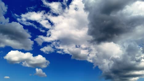 Clouds-In-The-Blue-Sky-In-Skujene,-Latvia---Low-Angle-Shot