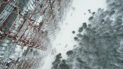 duga radar station steel antenna grid in winter chernobyl taiga forest