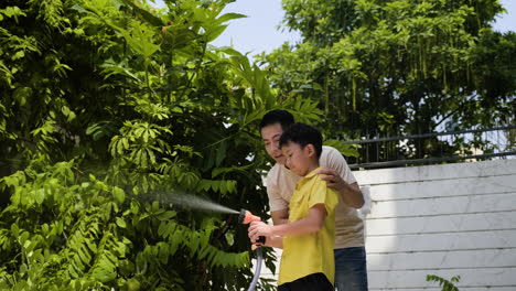 Asian-man-and-boy-in-the-backyard