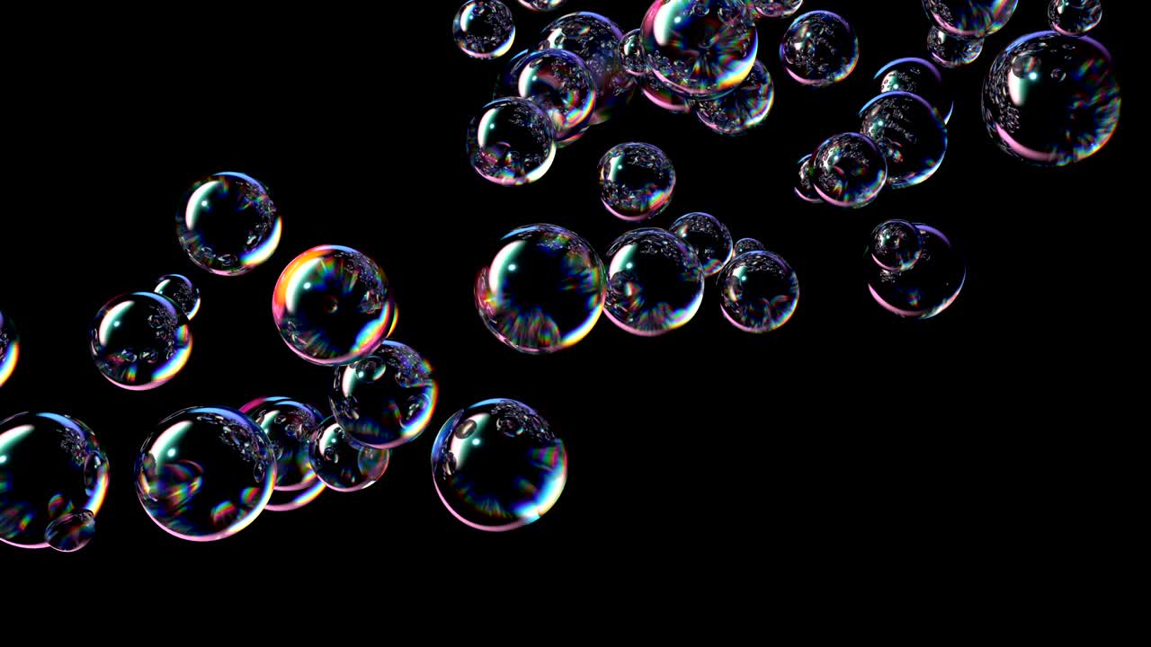 Beautiful Soap Bubbles Fly Up on a Black Background
