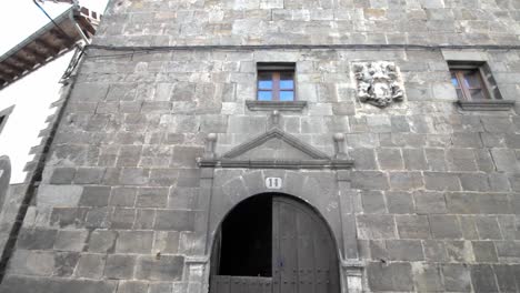 facade of old building in otsagabia - ochagavía , navarra, spain