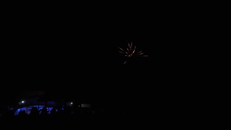 close-up, real beautiful festive fireworks near tent illuminated with light