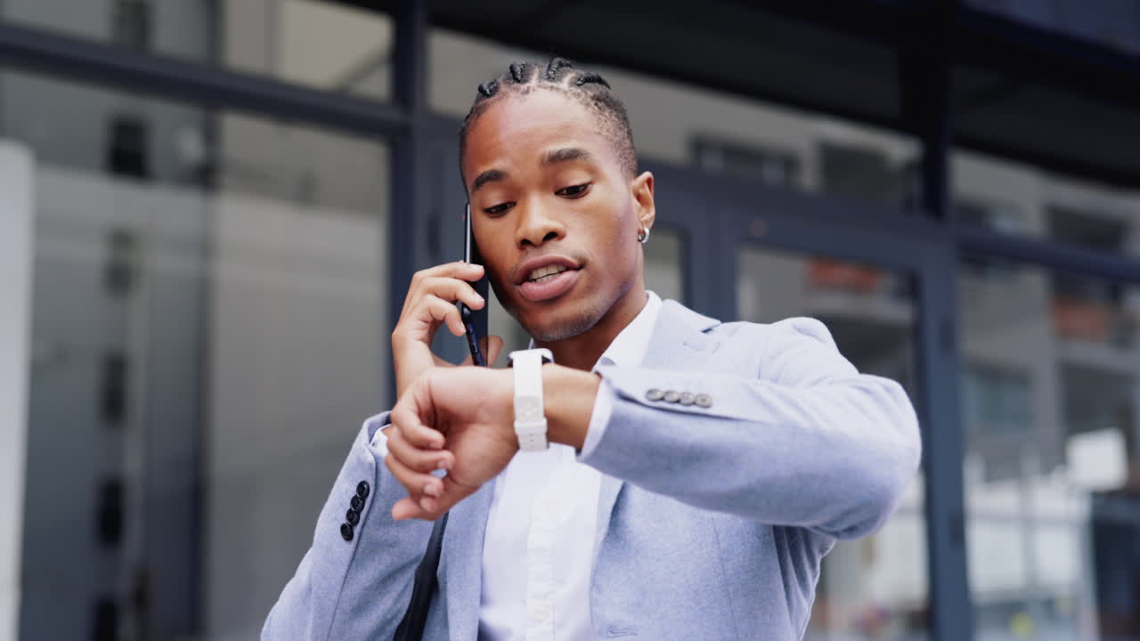 Black man, business phone call
