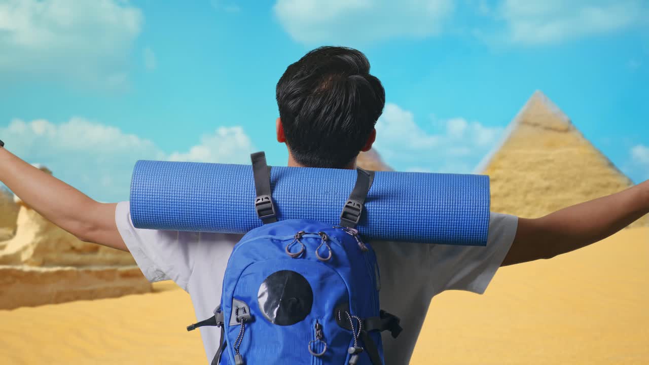 Backpacker in front of the Pyramids