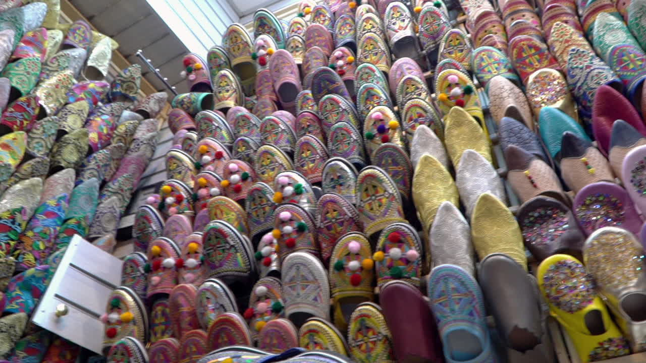 Discover the rich heritage of Morocco with authentic belgha leather shoes in Marrakech's vibrant old medina market