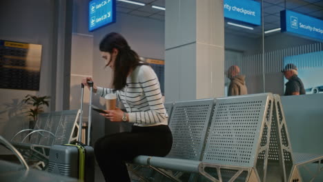 woman waiting in airport