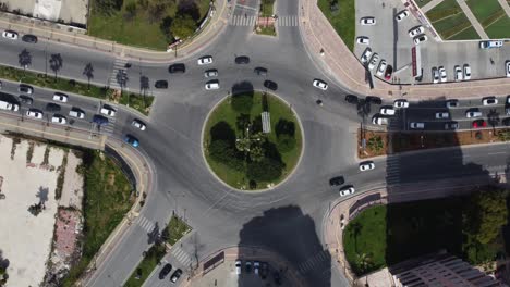 vehicles moving roundabout aerial drone