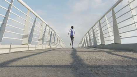 rear view of woman wearing hijab running