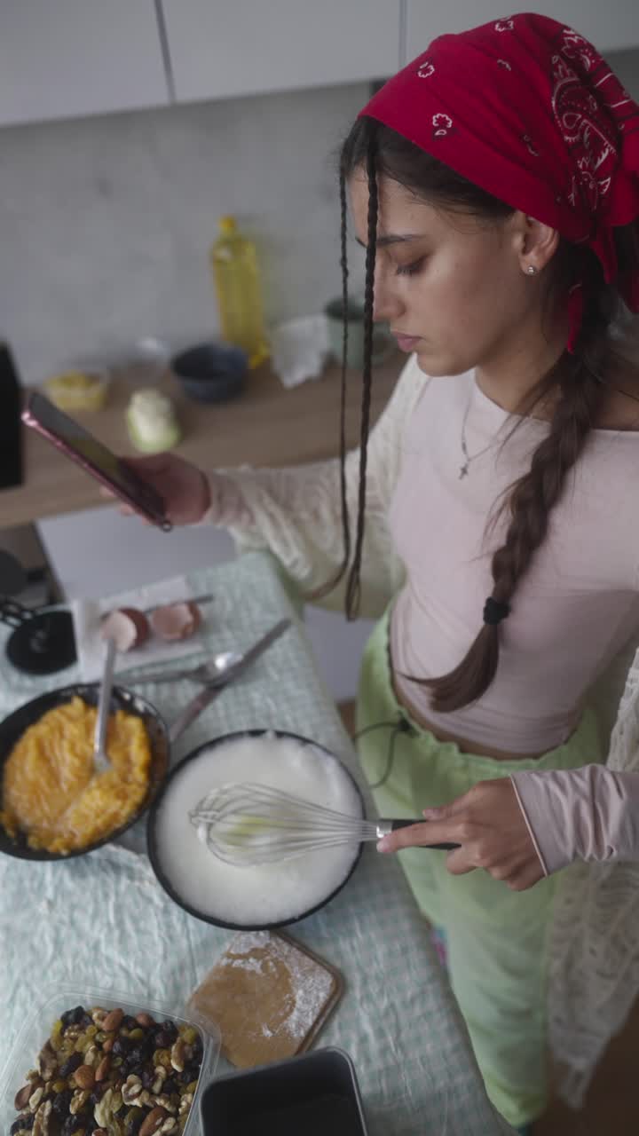 Woman Cooking and Making a Video of Recipe
