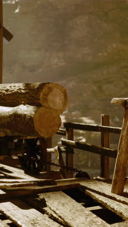 carro de madera con troncos