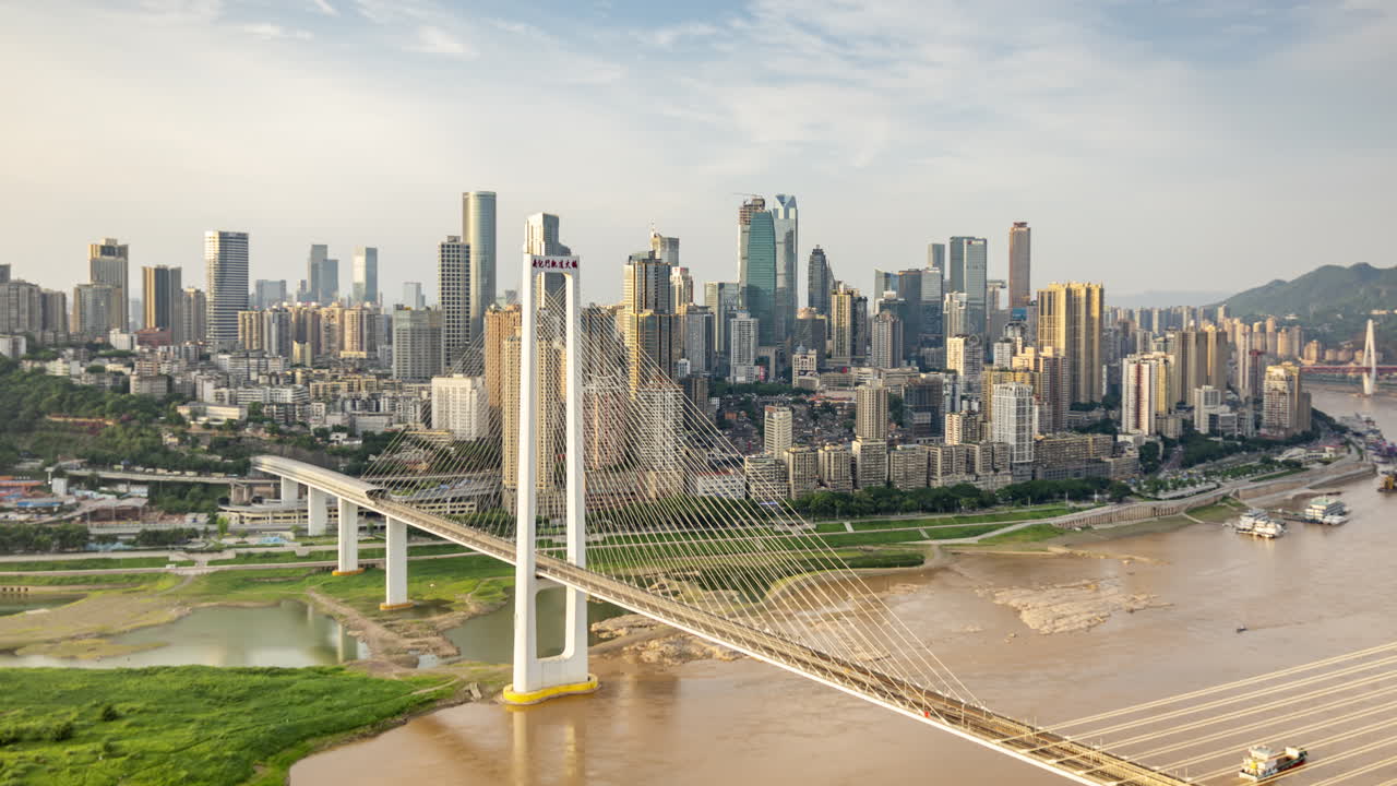 Timelapse of the amazing Chongqing cyberpunk city skyline from a high vantage point wirh the yangtze river