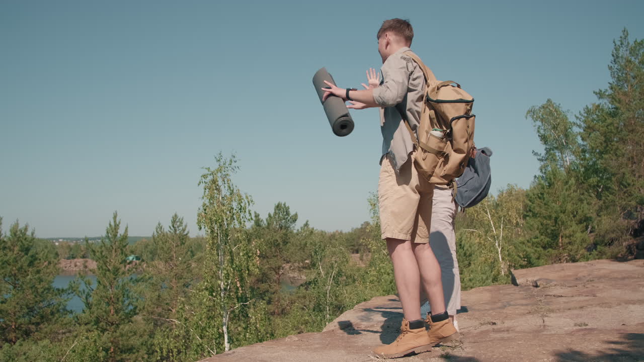 Group of Young People Enjoying Scenery on Hike