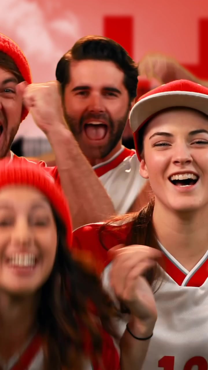 Animación de un grupo diverso de aficionados al deporte animando sobre un paisaje urbano con fondo rojo