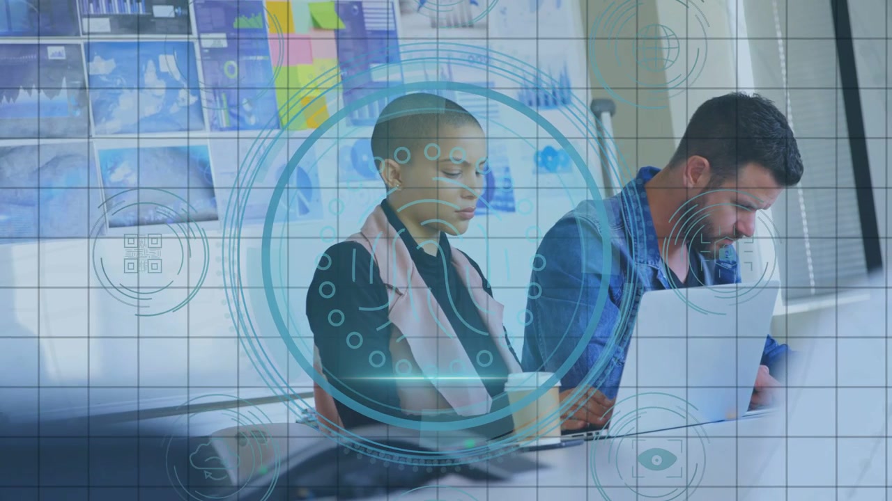 Woman and man typing at table DATA PROTECTION heading showing HUD growing over laptop securing data