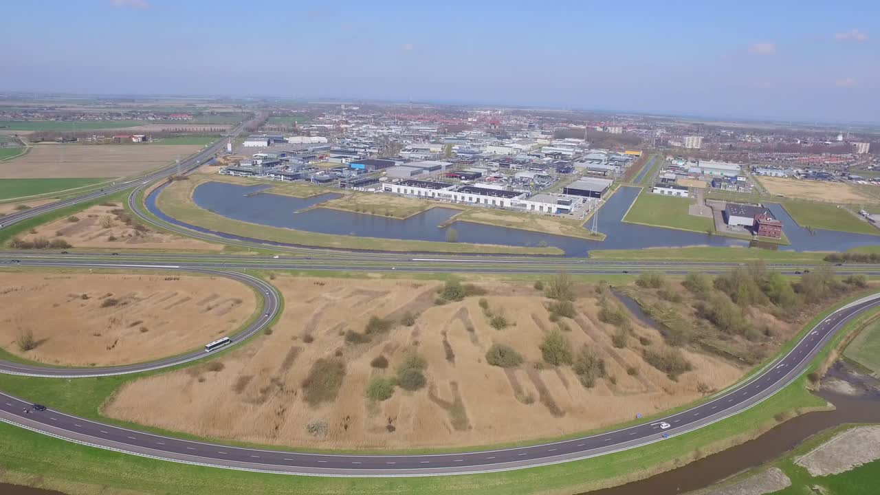 Aerial view of an industrial park and highway