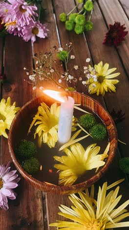 candle and flowers arrangement