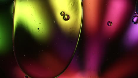 abstract colorful food oil drops bubbles and spheres flowing