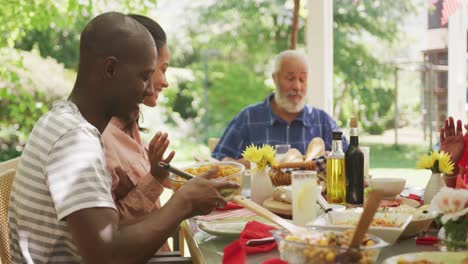 african american family spending time in garden together