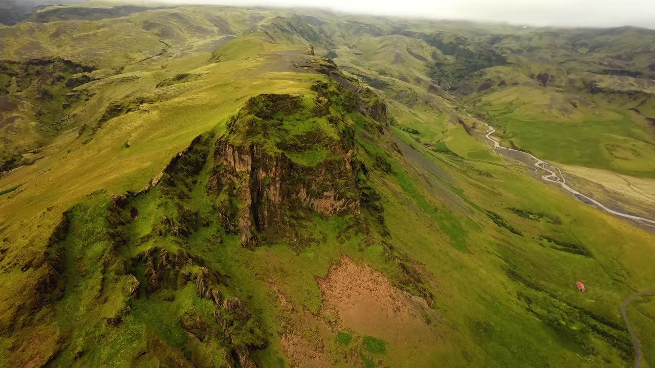 Aerial panoramic landscape view of Iceland mountain grasslands