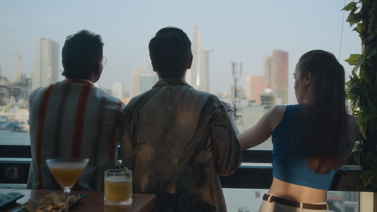Friends Visiting Local Cafe with Panoramic Window