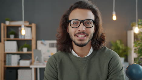 smiling man in office
