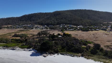 aerial view of bicheno town and the white sandy beach in tasmania, australia