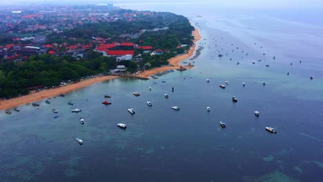 colorful fishing boats at the beachside resort town of sanur in bali, indonesia