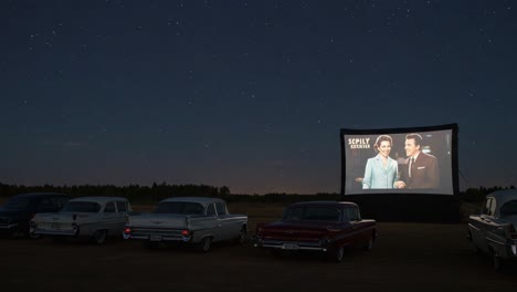 vintage drive-in experience under the stars featuring classic cars and nostalgic films in a picturesque night setting