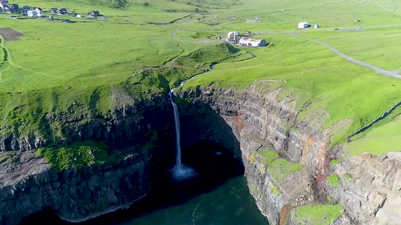 Discovering a stunning waterfall in a serene landscape