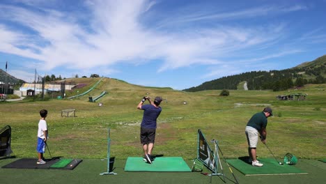 two people practicing golf in scenic piedmont