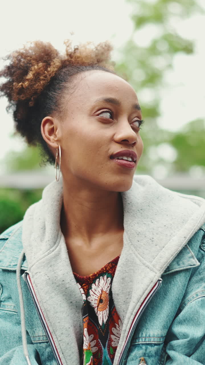 Portrait of a Smiling Woman with Hoop Earrings