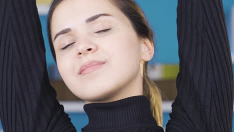 peaceful and happy young woman yawning.