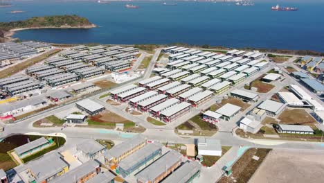 Covid19-Quarantine-compound-buildings-in-the-outskirts-of-Hong-Kong,-Aerial-view