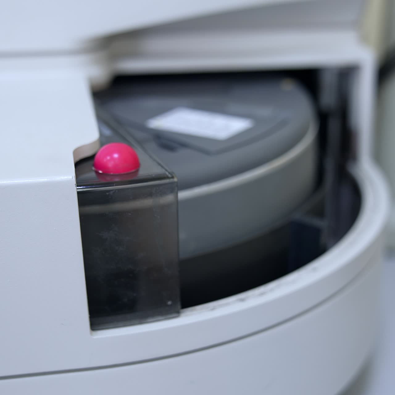 Few test tubes are moving in the apparatus. Close up. Advanced equipment in the technological science laboratory for medical tests