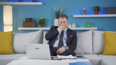 home office worker man thinking depressed and feeling unhappy.