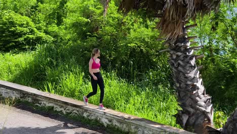 woman walking along a coastal path