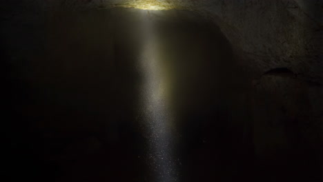 cave interior with sunlight beam