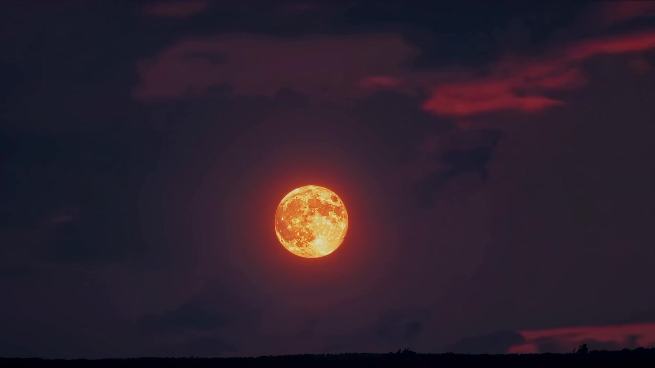 Time Lapse of Full Moon Rising in Red Sunset Sky