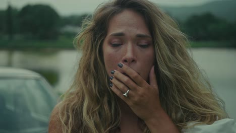 woman crying outdoors