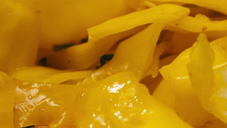 close-up of fermented yellow cabbage on plate. preservation of vegetables in glass jars. fermentation preserved vegetables. sauerkraut with spices.