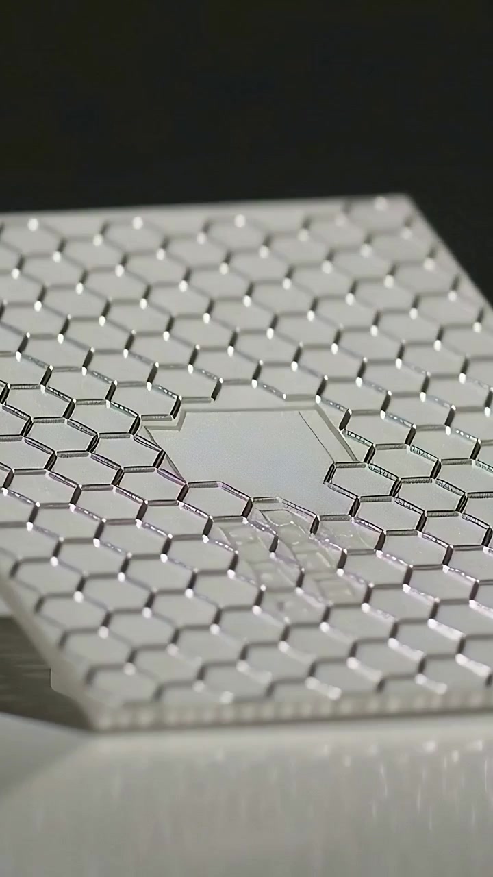 Vertical video: Entering hex panel aligning over base in studio, showing cutout and residue