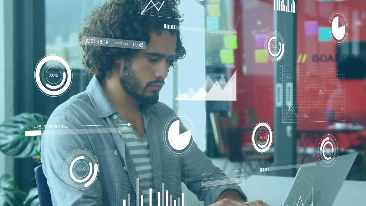 Working on laptop, man analyzing data with animation graphics overlay